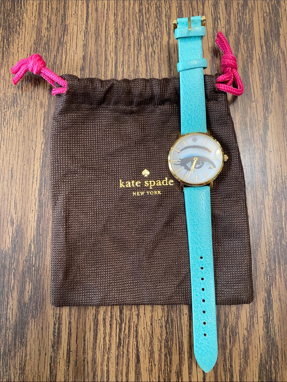 Kate Spade Turquoise and Gold blinking Eye Motif hologram Leather Strap Watch